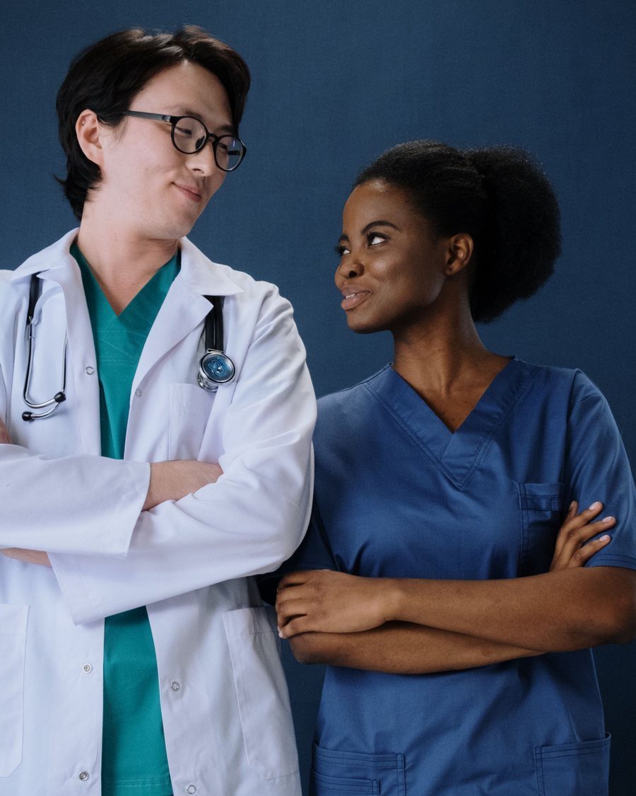Two medical professionals standing confidently