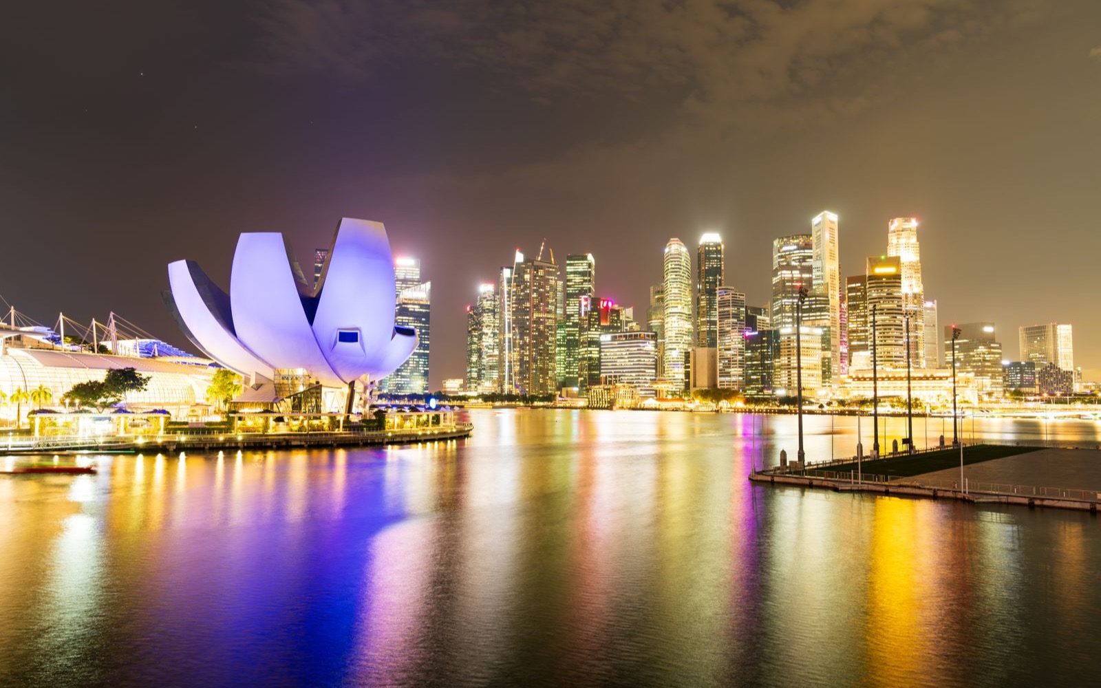 Marina Bay lit up after dark.