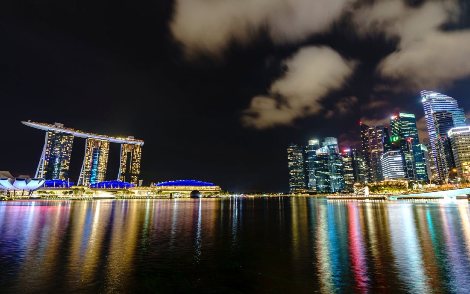 Singapore's waterfront skyline at night.
